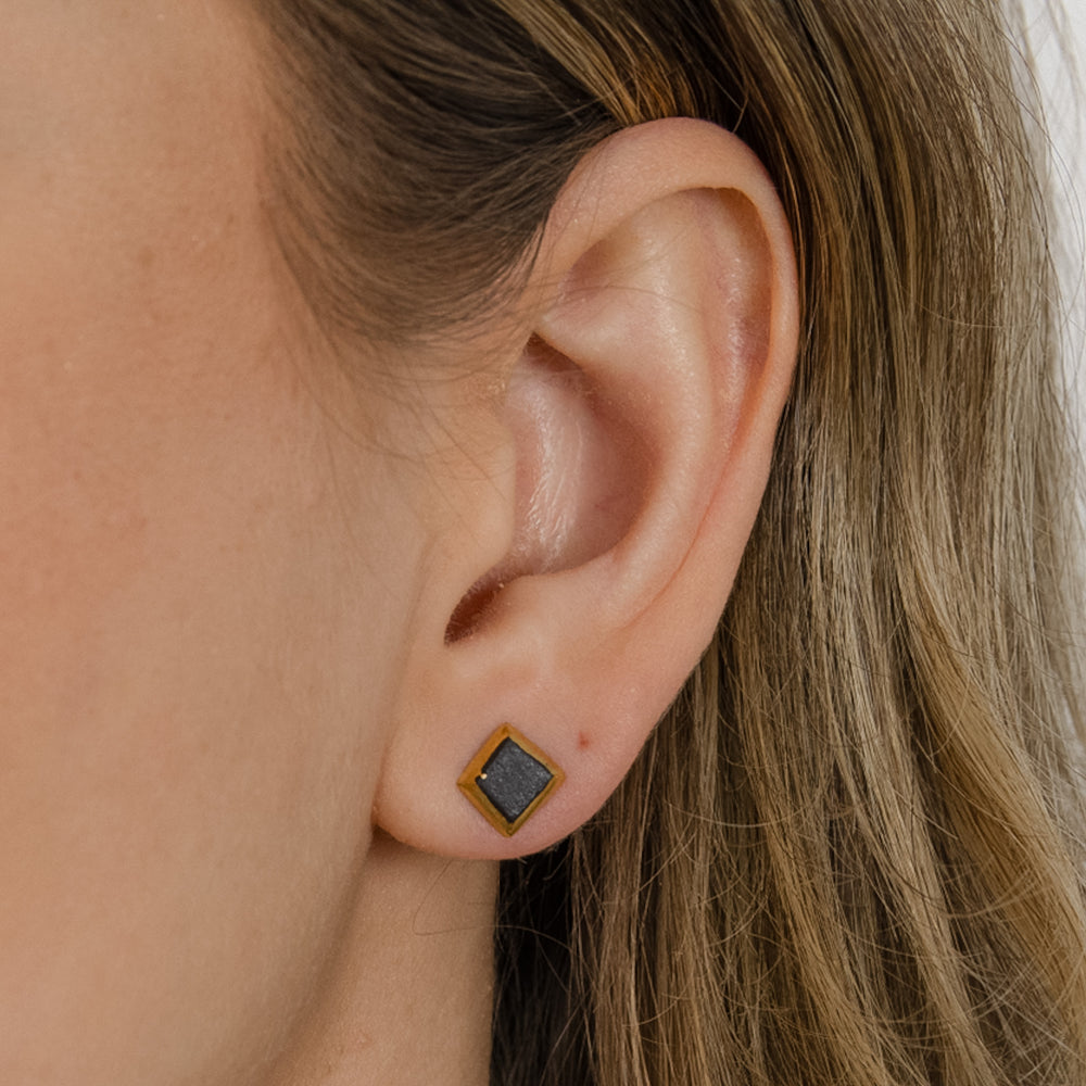 Black porcelain earring with gold