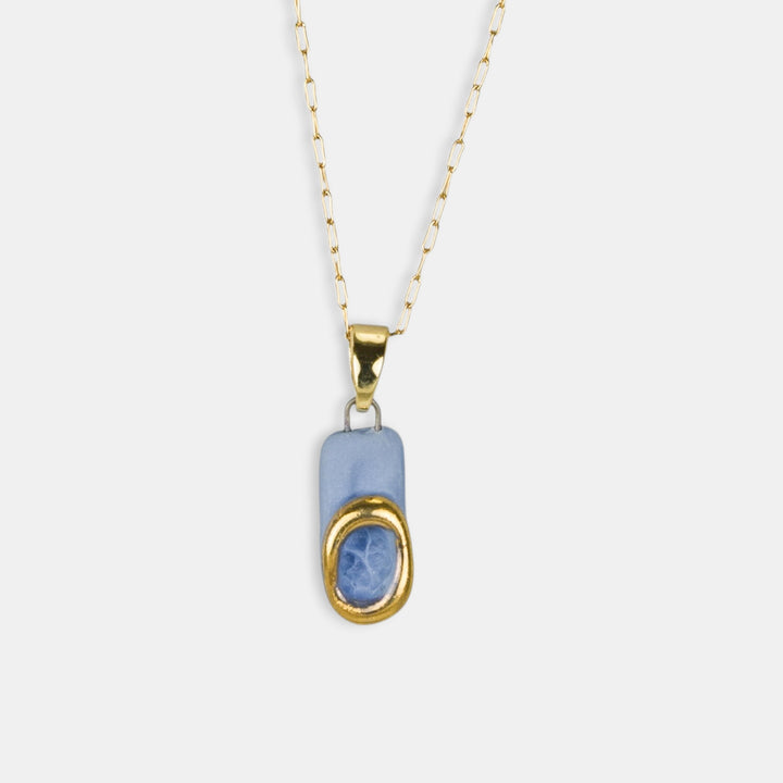 porcelain pendant by freakyfoxx