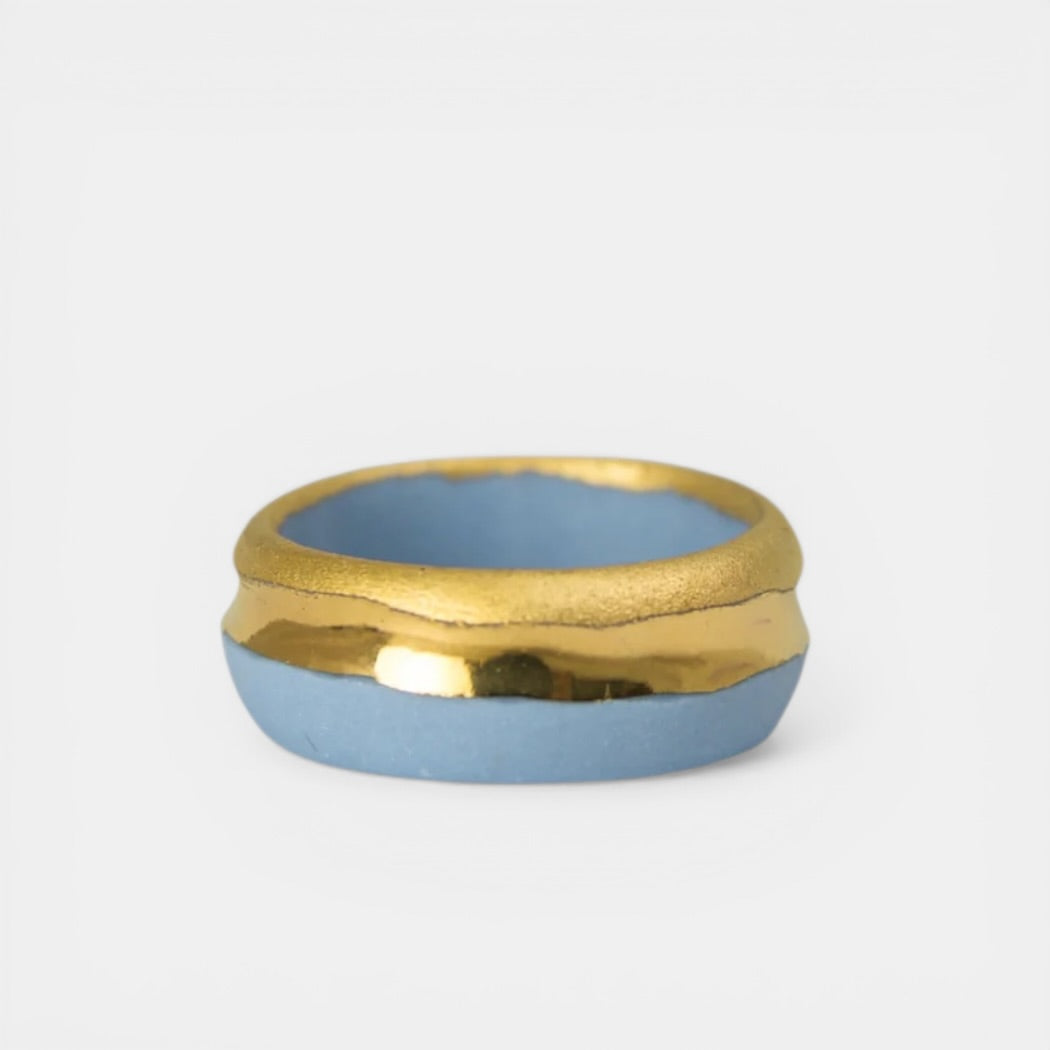 porcelain Ring with gold band and blue ceramic body by freakyfoxx on a white background