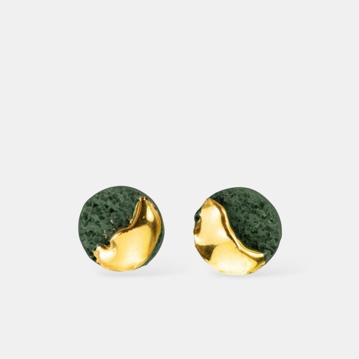 Pair of gold and green round stud earrings by freakyfoxx on a white background