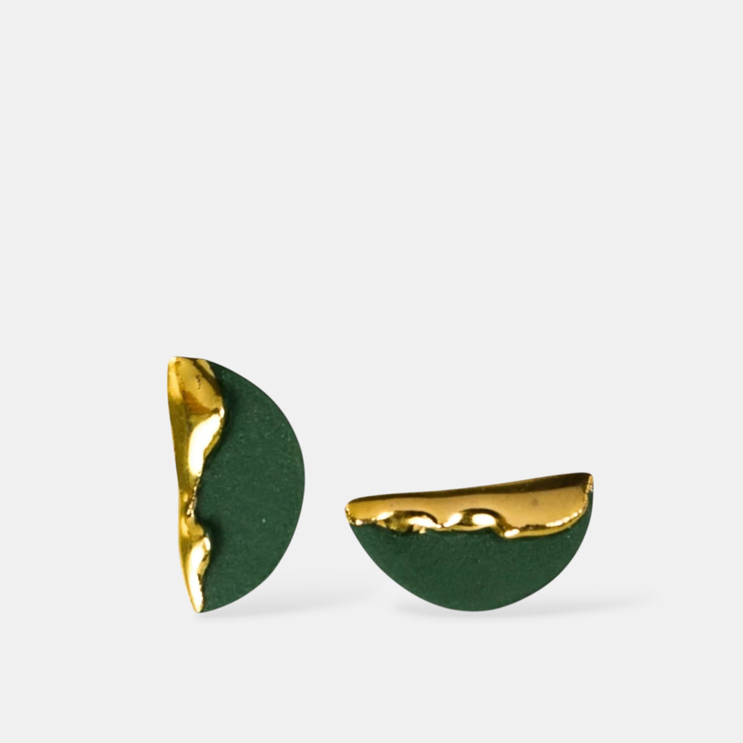 Gold and green half-circle porcelain earrings by FreakyFoxx on a white background
