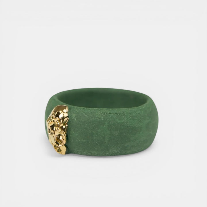 matte green porcelain ring with a gold accent by freakyfoxx on a light gray background