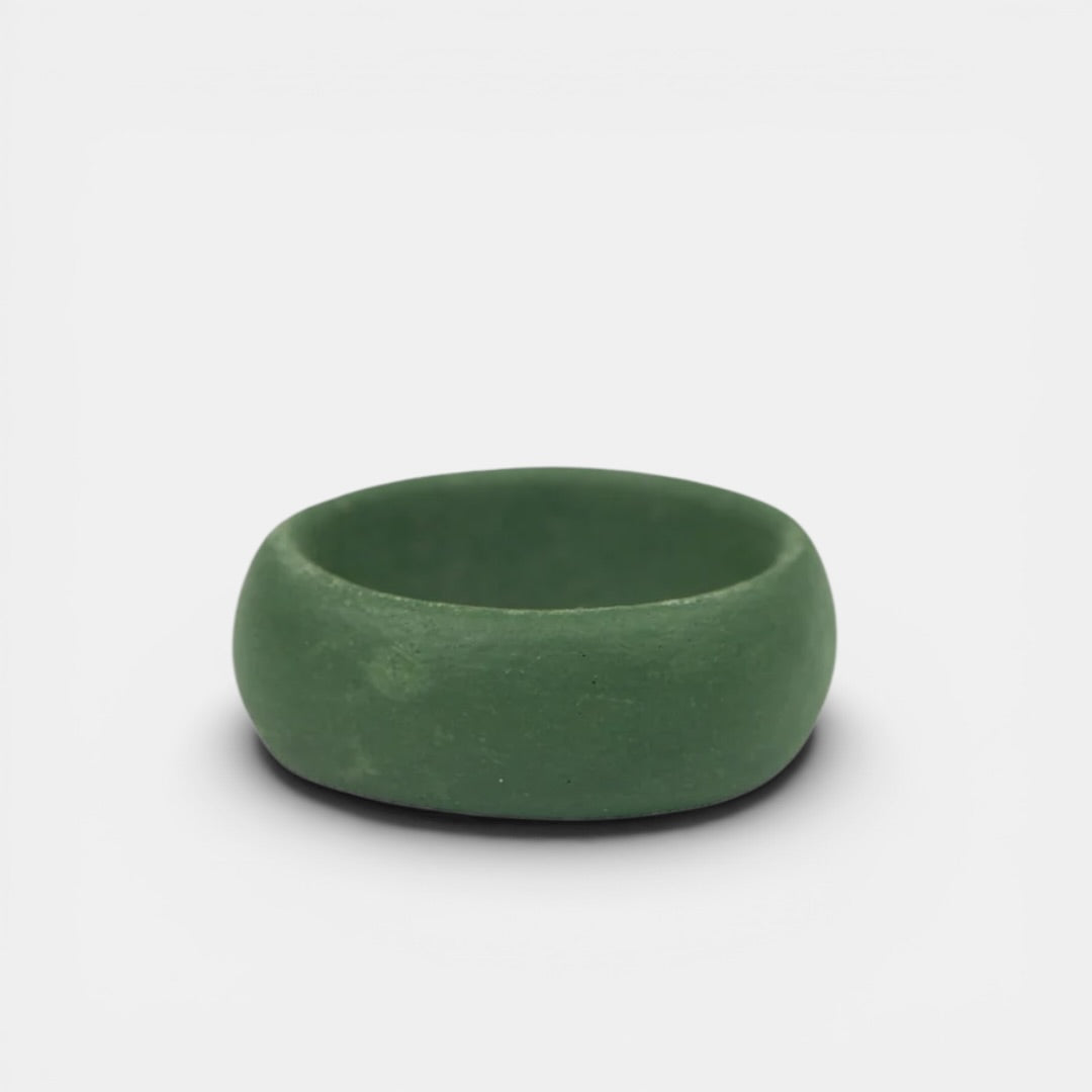 matte green porcelain ring by freakyfoxx on a light gray background