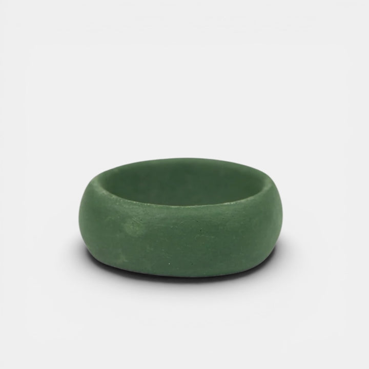 matte green porcelain ring by freakyfoxx on a light gray background