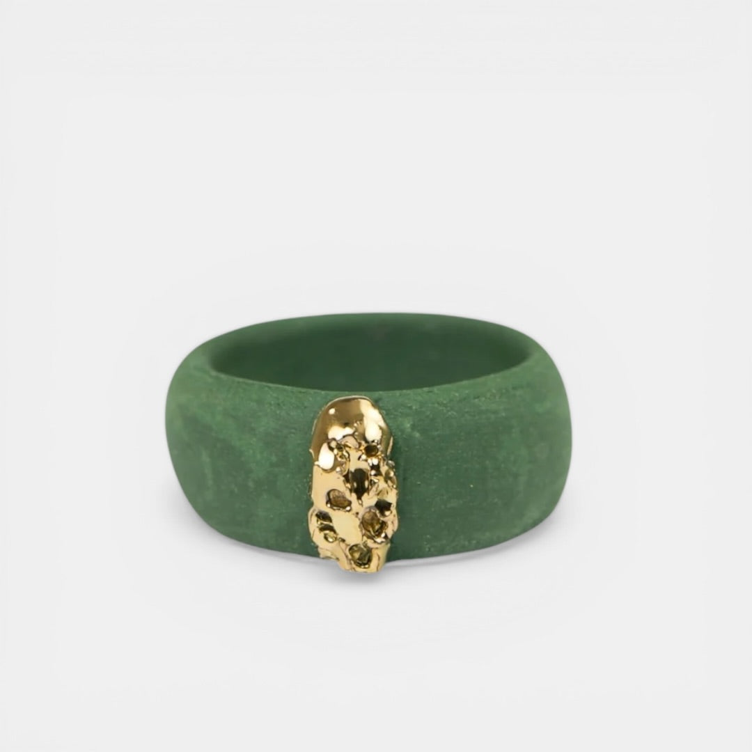 matte green porcelain ring with a gold accent by freakyfoxx on a light gray background