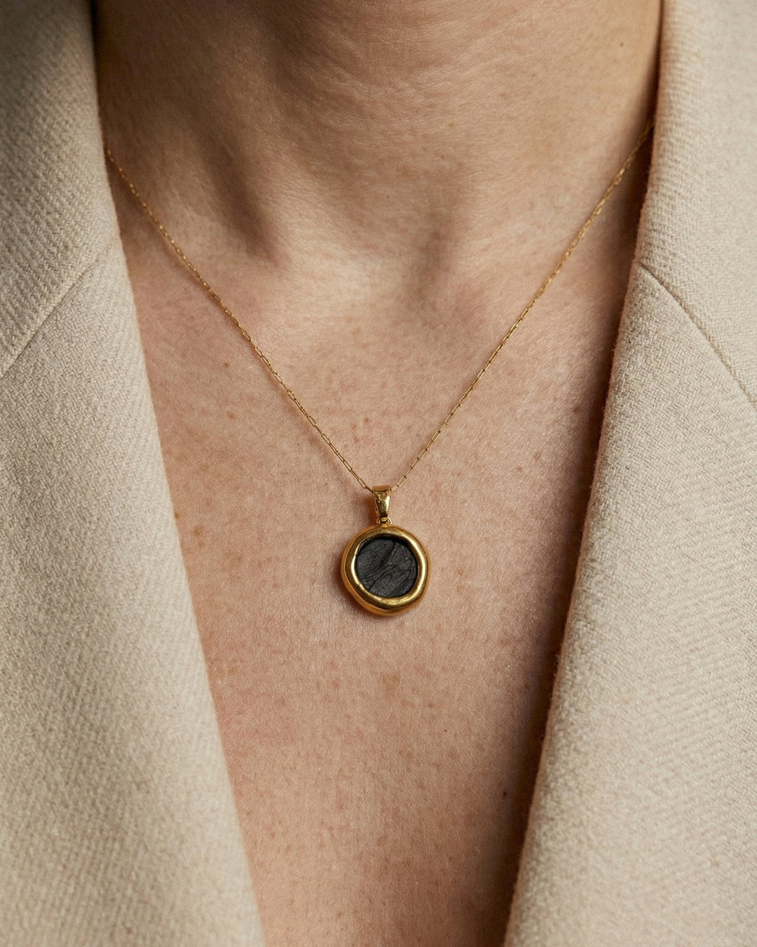 Necklace with  black porcelain pendant plated with gold by freakyfoxx