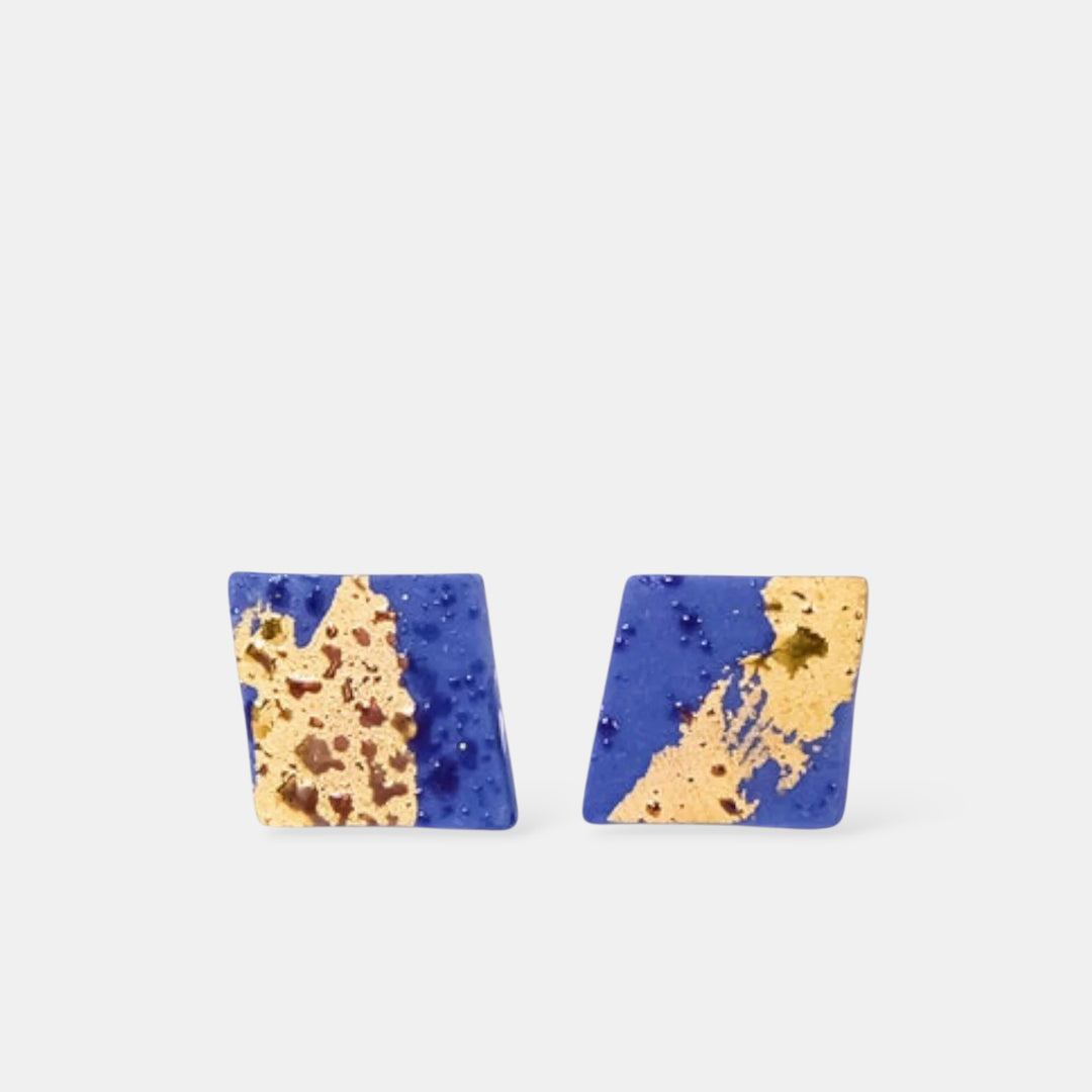 Pair of square earrings with blue porcelain and gold by freakyfoxx on a white background