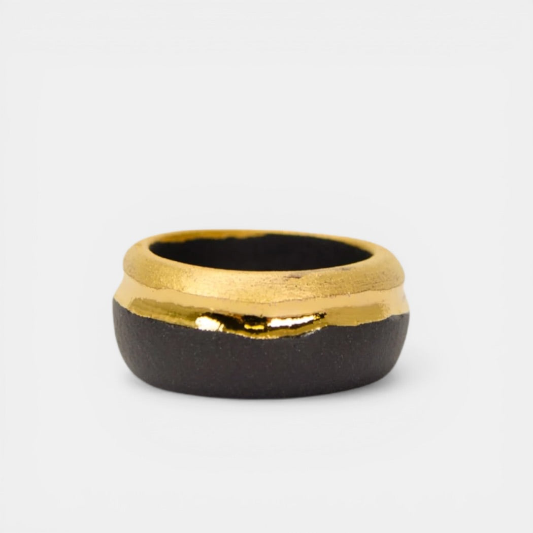 black porcelain ring with gold by freakyfoxx