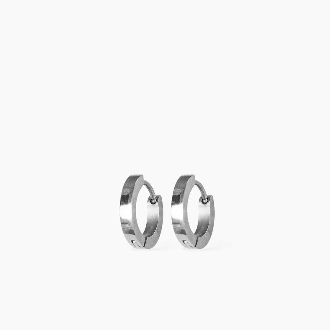 Pair of hypoallergenic 316l stainless steel hoop earrings on a white background 