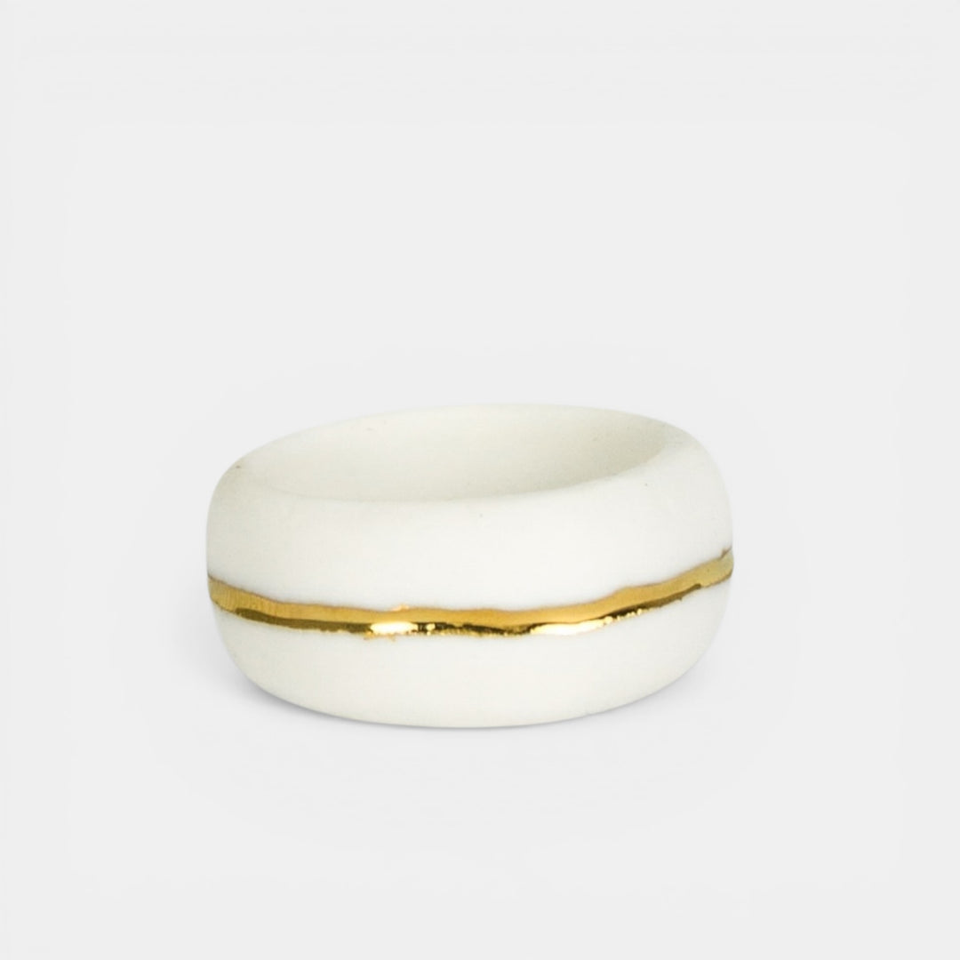 white porcelain ring with gold 