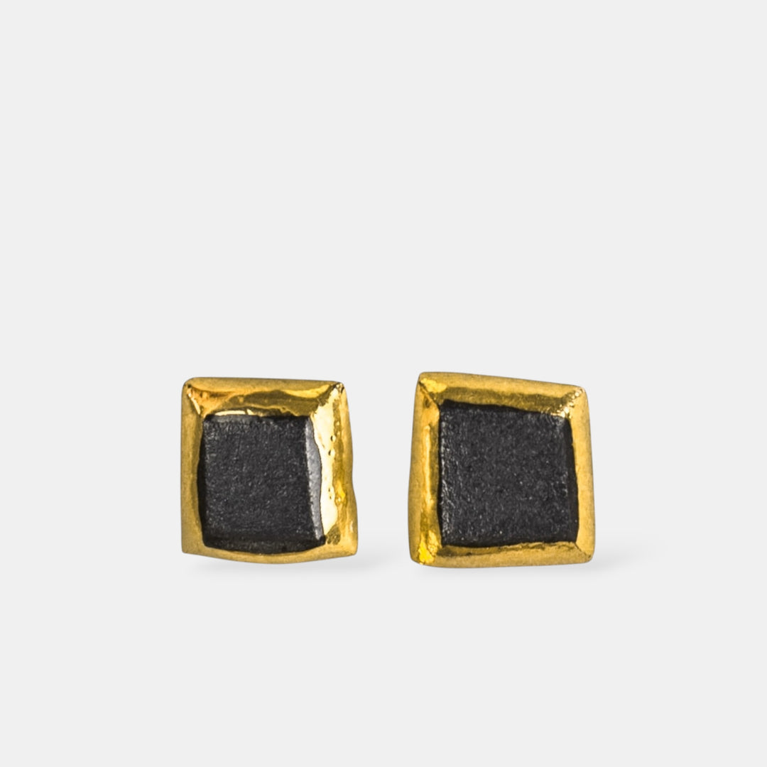 Gold-framed black square stud earrings from porcelain by freakyfoxx on a light gray background